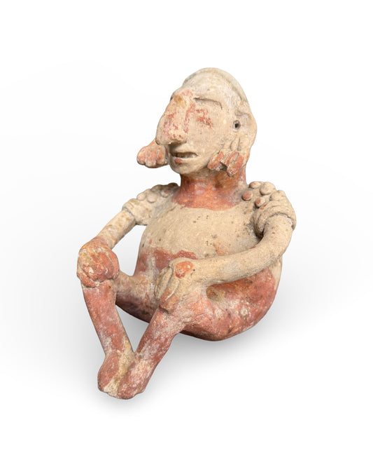 A FINE PRE-COLUMBIAN JALISCO SEATED MALE FIGURE, SAN JUANITO TYPE (CUISILLOS)